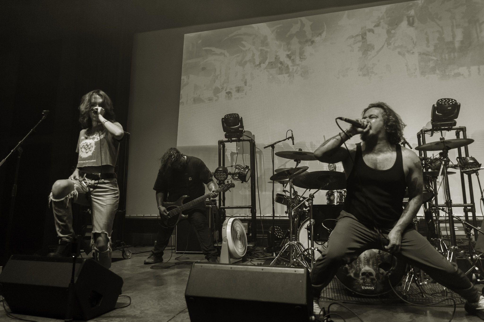 Black and white performance showing multiple musicians