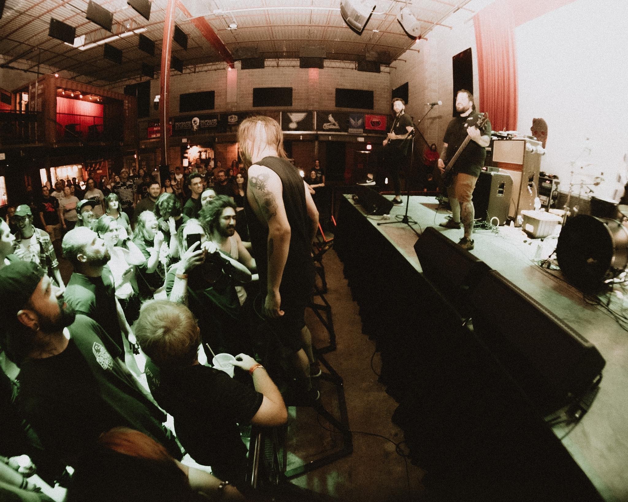 Vocalist engaging the audience from the floor